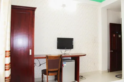Deluxe-Queen-Zimmer mit zwei Queen-Betten — Mai Guest House